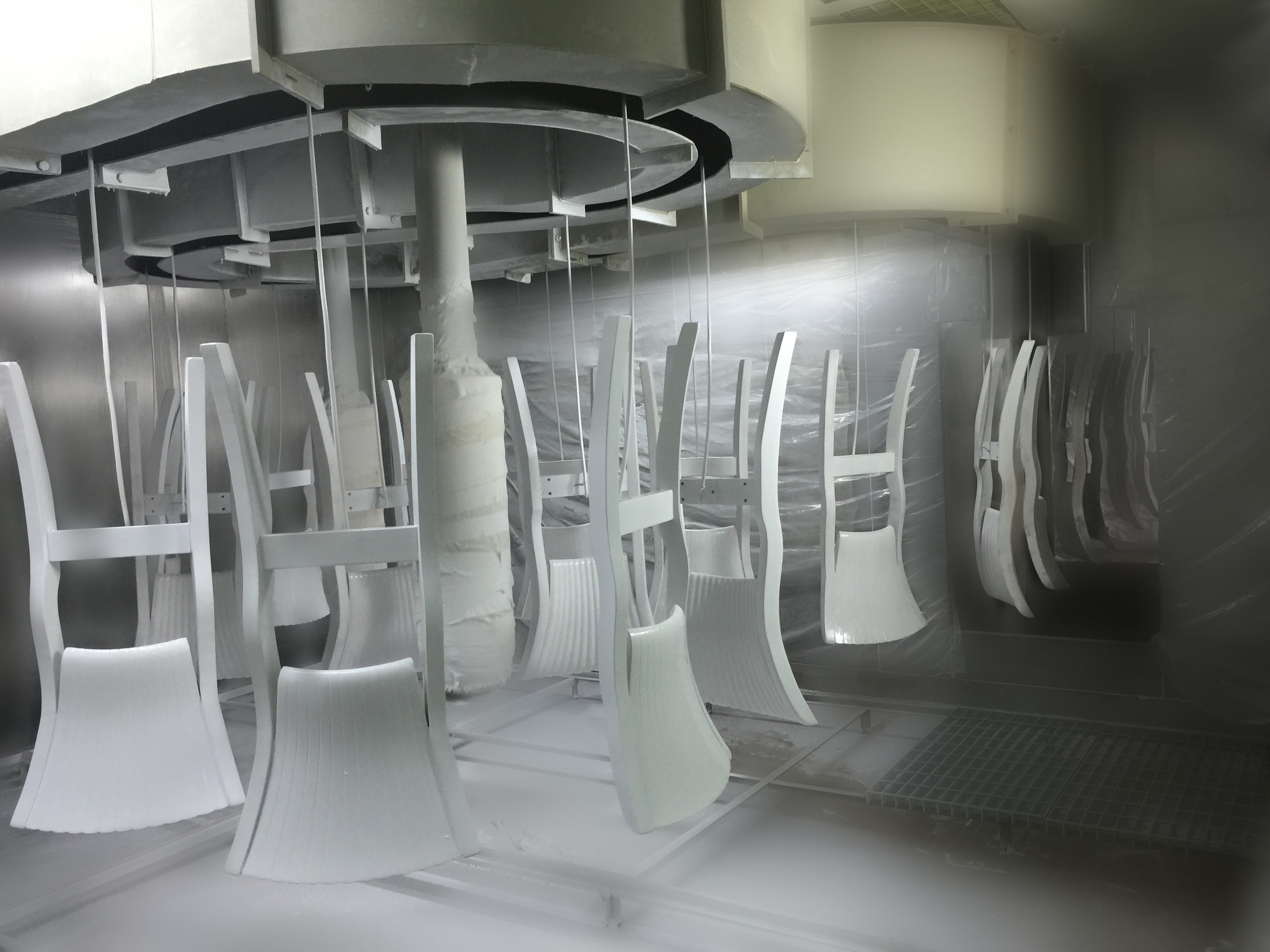 Wood chairs coating line in operation